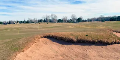 Grass bordering a sandtrap at the golf course